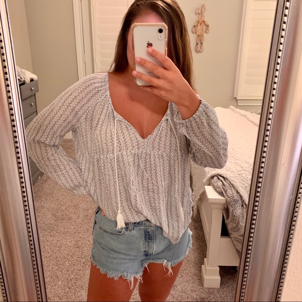 flowy long sleeve top with tassels